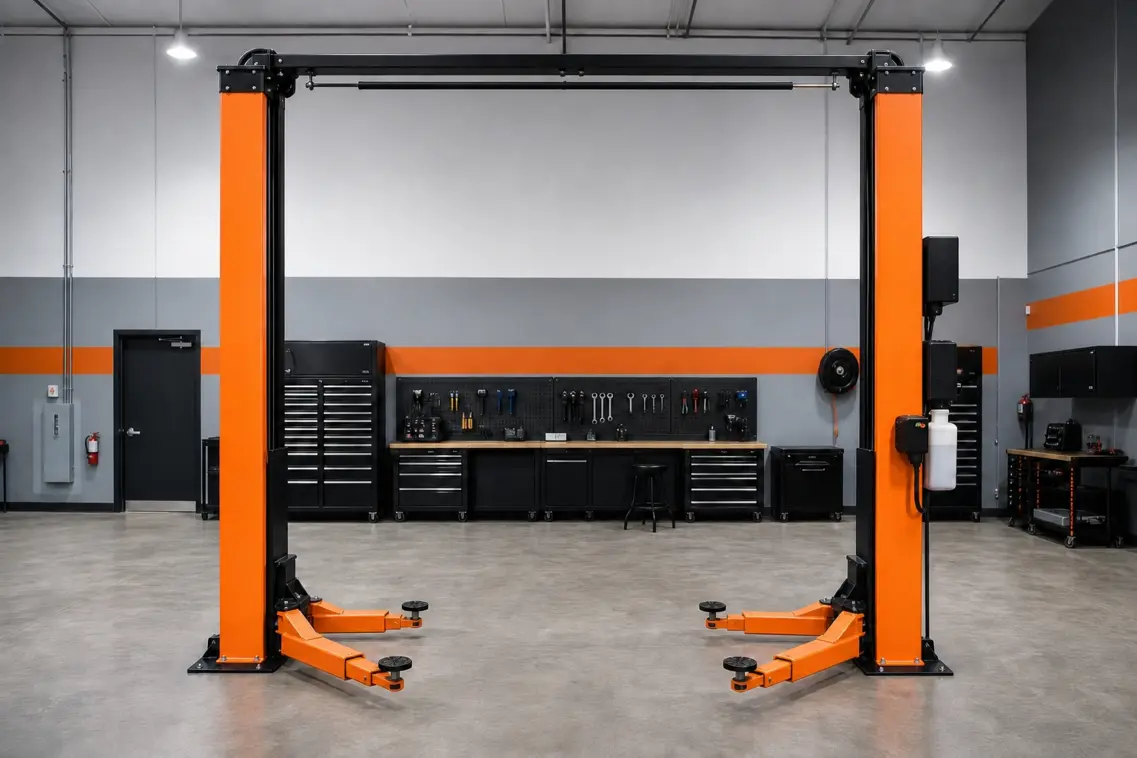Newly installed two-post automotive lift in a clean modern shop bay