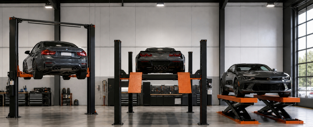 Comparison of two-post, four-post, and scissor automotive lifts in a garage